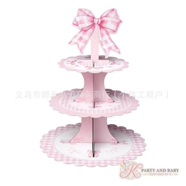 Three-tier pink gingham cake stand with a bow on top