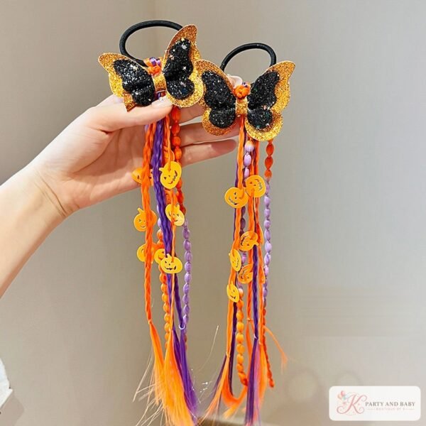 Halloween butterfly hair ties with orange and purple braids and pumpkin charms Halloween butterfly hair ties with orange and purple braids and pumpkin charms