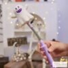 White ghost light-up spring wand with purple handle